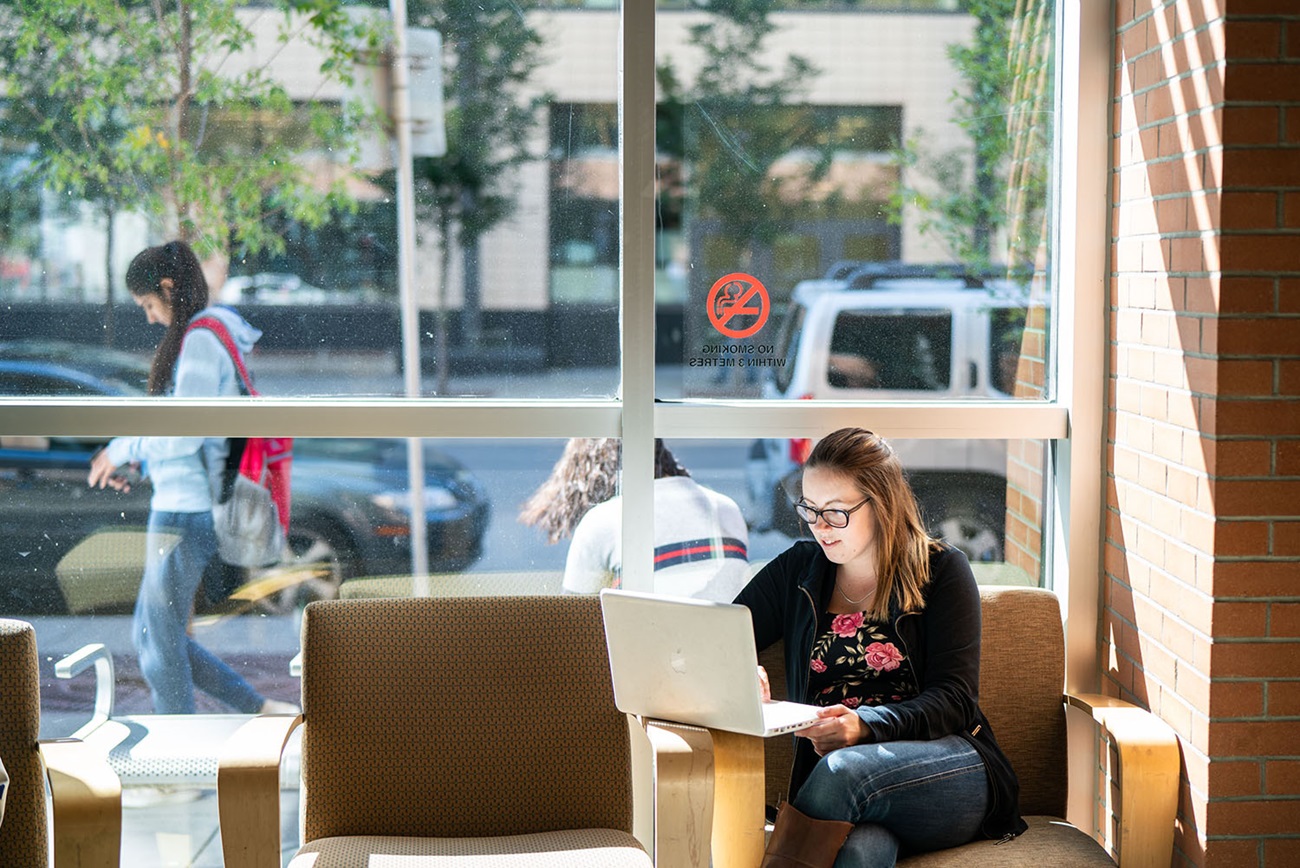 Learner looking at laptop